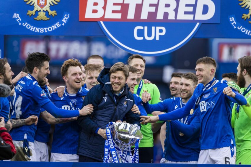 There was no medal but the Saints players made sure Davidson was front and centre for the Hampden celebrations.