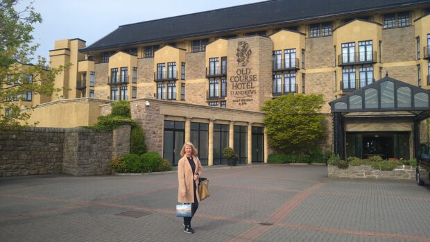 A photo of Laura Coventry outside the Old Course Hotel & Spa in St Andrews.