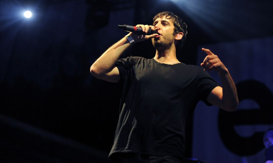 Example performing at a live show.