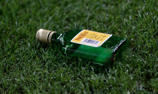Smith smashed the Buckfast bottle on his victim's head then tried to stab him with the broken glass. Image: Shutterstock.