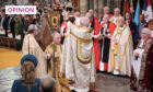 King Charles III receives the St Edward's Crown during his coronation ceremony in Westminster Abbey.