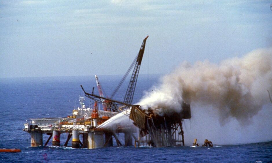 The Piper Alpha oil rig burning following the catastrophe in 1988. Image: DC Thomson.