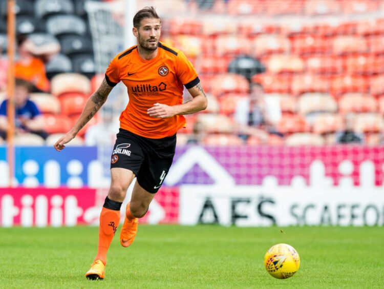 Frederic Frans surges forward for Dundee United at Tannadice 