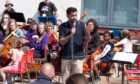First Minister Humza Yousaf helped celebrate Big Noise Douglas at a special performance on Saturday