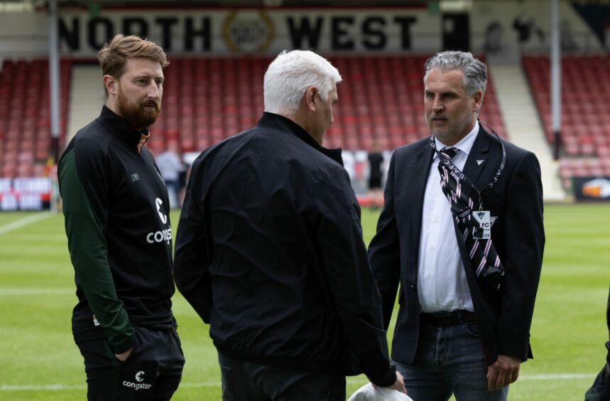 Dunfermline Athletic sporting director Thomas Meggle meets up with staff from former club St Pauli before the pre-season friendly between the sides. Image: Ross Parker / SNS Group.