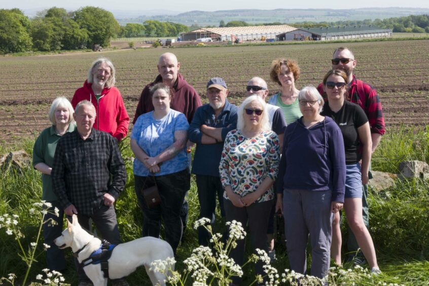 Members of Cononsyth Protest Group in front of Cononsyth Farm.