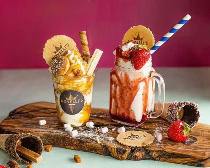 Two milkshakes topped with caramel and strawberries from Novelli's along the Fife Coastal Path