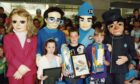 Some of the children who won prizes are pictured with the Thunderbirds in July 1993. Image: DC Thomson.
