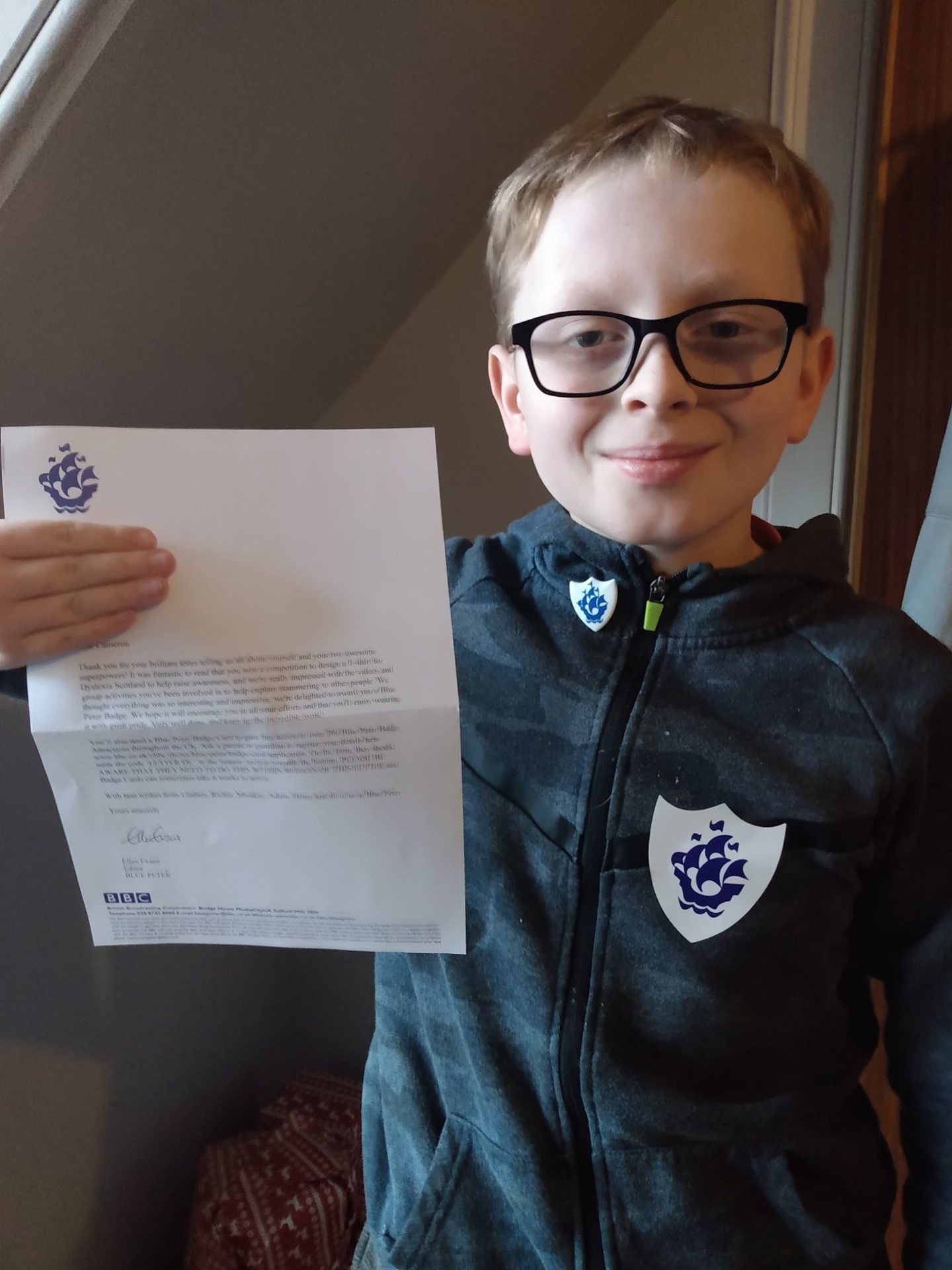 Cameron Coupar with his Blue Peter badge.