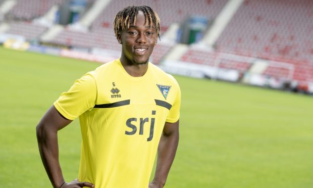 Ewan Otoo is all smiles after signing for Dunfermline on a permanent deal in the summer.