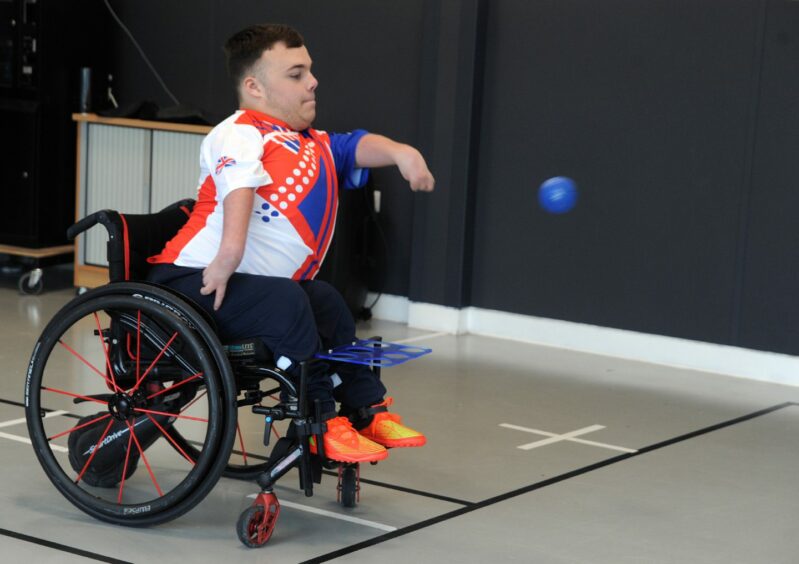 Tyler McLelland takes aim during Boccia training in Glenrothes