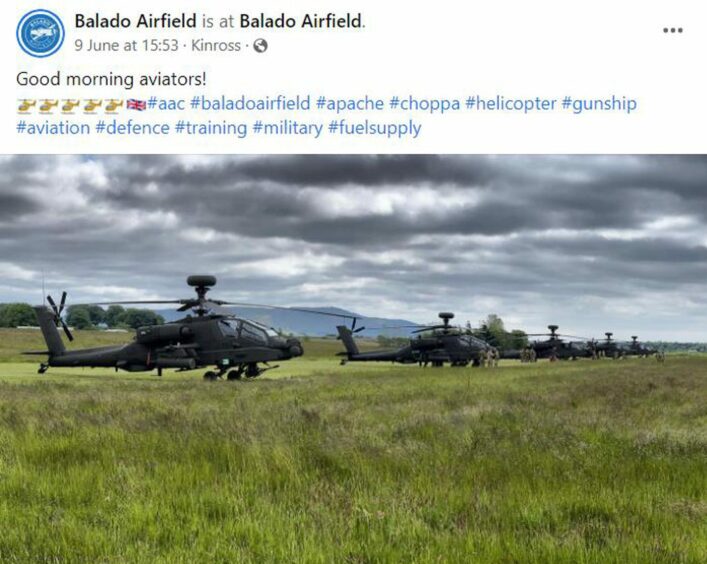 Four Apache helicopters at the airfield.