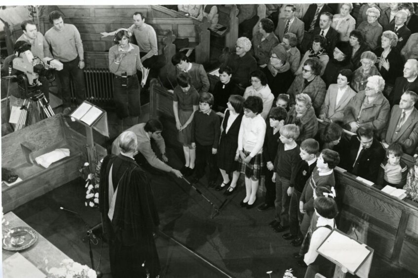 Camera crew from Grampian TV filming morning service at the High Kirk in March 1984