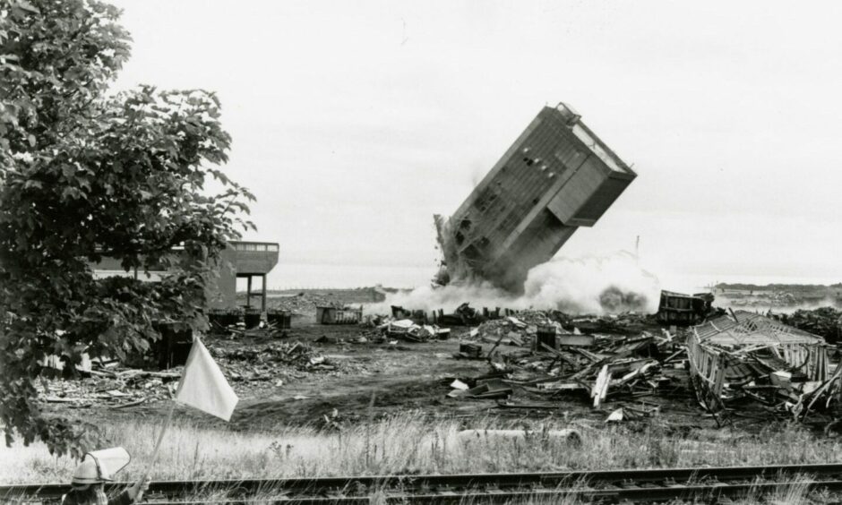 History comes crashing down as the first tower at Seafield pit hits the dust back in 1989. Image: DC Thomson.