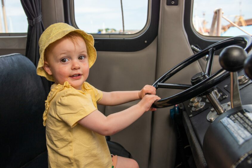 lsla Miller, 2, in the wheelhouse of the Arbroath lifeboat Inchcape.