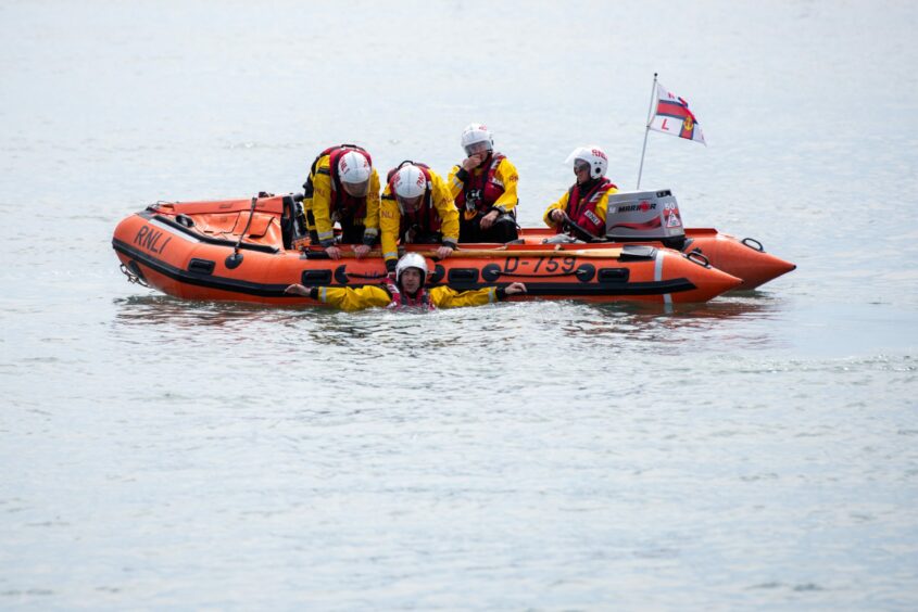 Crew demonstrate their lifesaving skills.