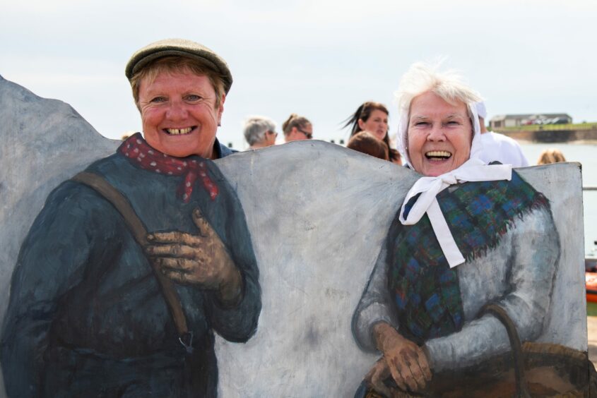 Guild members Linda Durno and Edith Cargill had fun at the fisherwife selfie set-up.