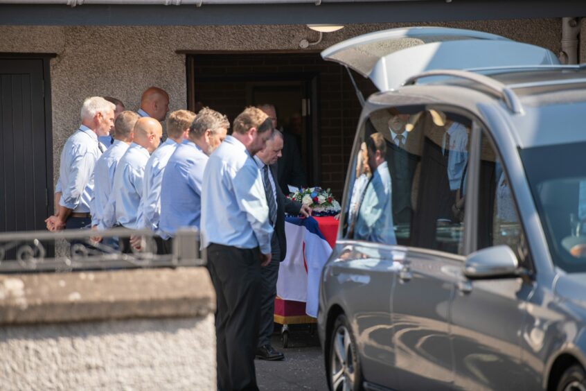 RNLI crew forming a guard of honour for former crew member Frank Donnelly at his funeral. Picture by Kim Cessford / DC Thomson.