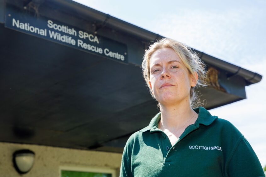 April Dodds stands in front of the Scottish SPCA National Wildlife Rescue Centre in Fishcross