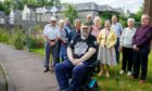 Residents of the Hanover Gardens sheltered housing complex in Auchterarder outside the derelict plot.