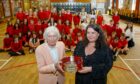 Sheila Walker, the great great grand daughter of legendary St Andrews golfer 'Old' Tom Morris, visited Lawhead Primary in St Andrews, and showed off Young Tommy's Championship belt.