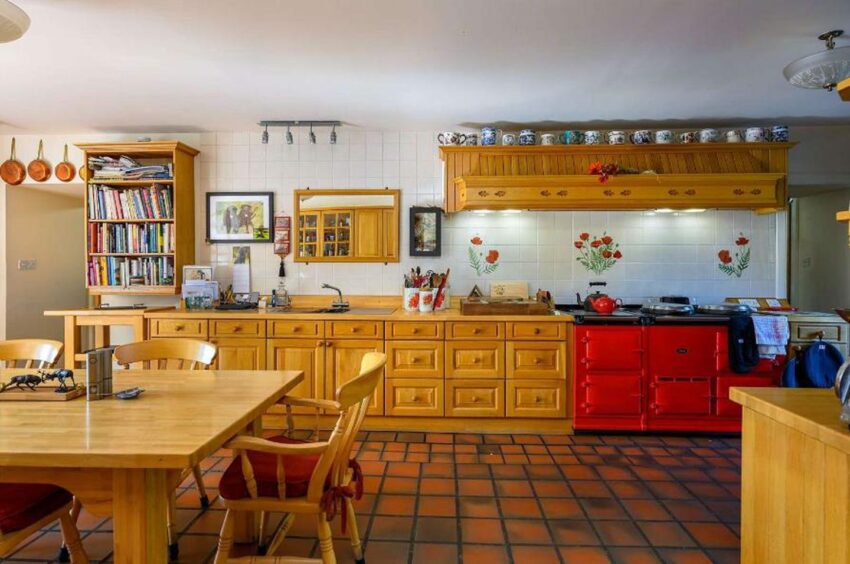 A view of the property's kitchen including a red Aga.