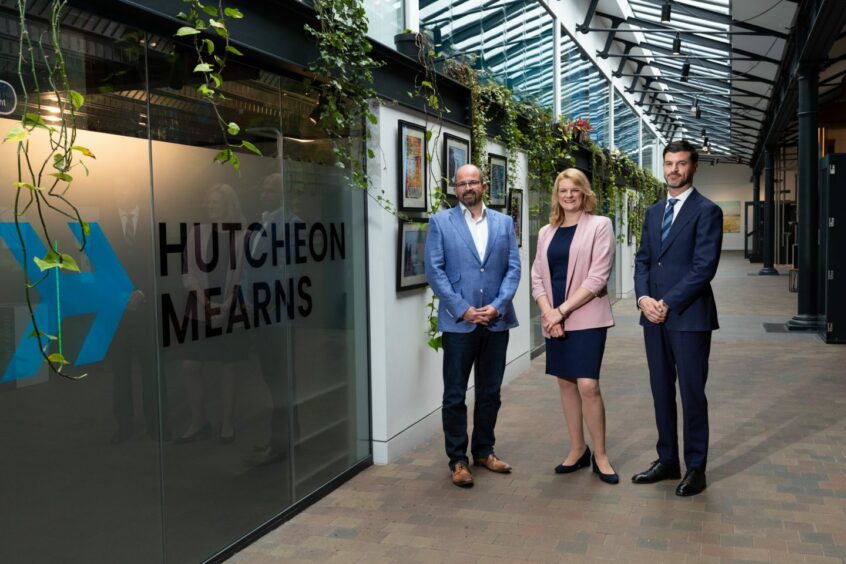 Hutcheon Mearns finance recruitment team in Dundee stood outside of their office.