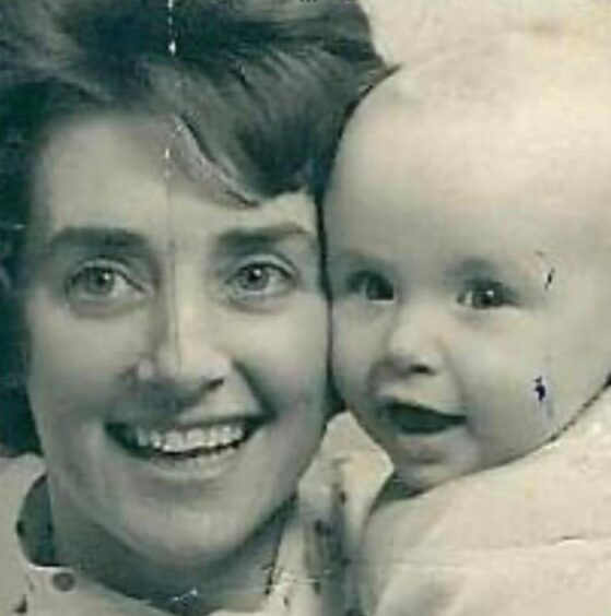 Marion Nicolson with John as a baby.