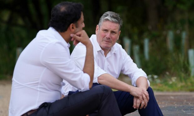Anas Sarwar and Sir Keir Starmer face questions over energy policy. Image: PA.