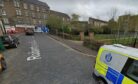 The woman was robbed on a path leading from Robertson Street in Dundee. Image: Google Street View