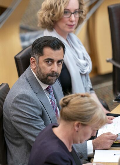 Humza Yousaf with the Green Party's Lorna Slater and deputy first minister Shona Robison in the Scottish Parliament.