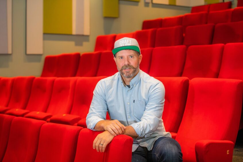 Brett DeWoody, acting chair of The Birks Cinema Trust, inside the cinema.