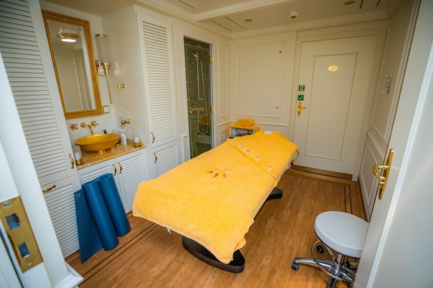 Spa room featuring a massage table.