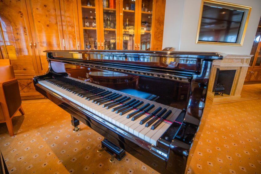 Steinway and Sons grand piano inside ship.