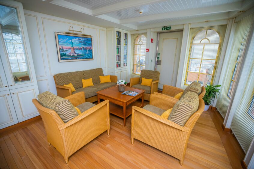 Comfortable sofas in the ship's library.