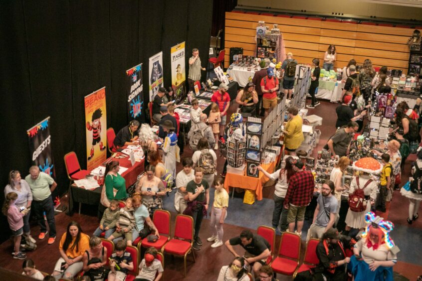 Comic Con fans descend on Dundee's Caird Hall for the ACME Comic Con, wearing the costumes of their favourite characters in gaming, comics, magazines and fantasy, Fans stroll around the stalls with many things for sale. Image: Steve Brown/DC Thomson