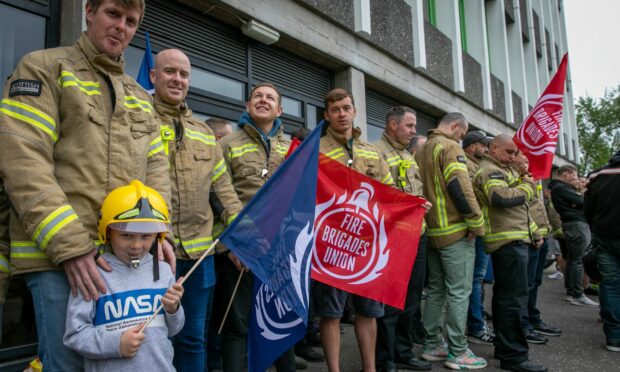 Firefighters demonstrate in Glenrothes against fire service cuts.
