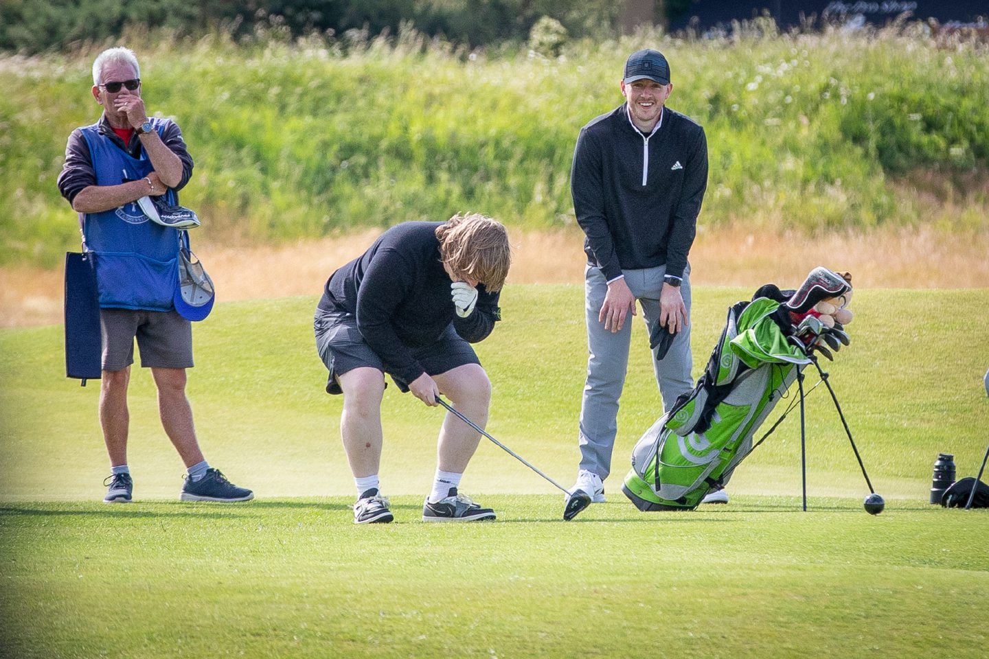 Lewis Capaldi's reaction after his sliced shot on the 18th at St Andrews Old Course hit a passing car.