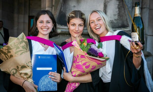 Left to right - Elizabeth Garity (22) from Boston, USA, Maja Kuehner (23) from Germany and Felicia Kroon (23) from Sweden all graduated in Neuro Science. Image: Steve Brown/DC Thomson
