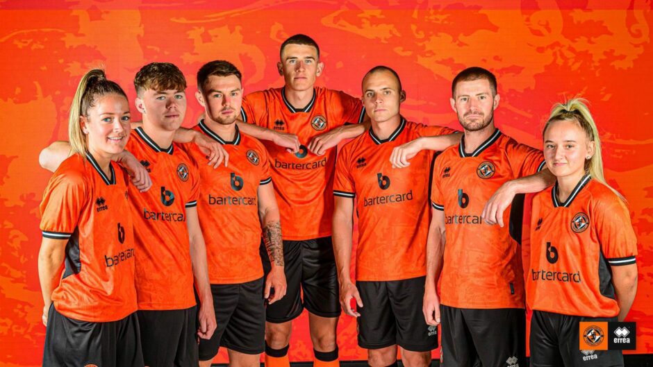 Dundee United men and women's players show off the new home kit