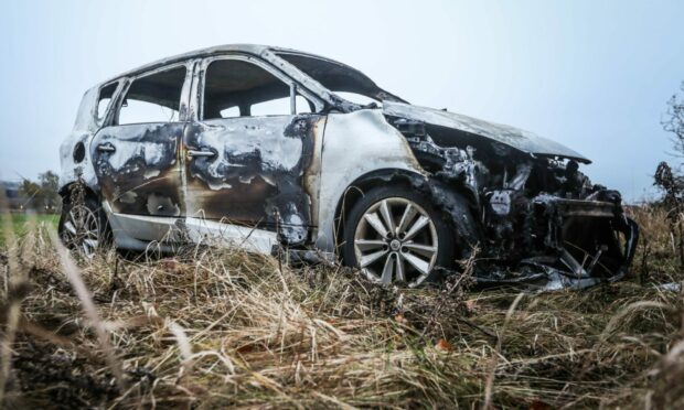 A car burnt out after being stolen and dumped in a field