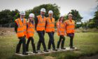 Pupils Gareth Stubbs, Rachael Watson and Chrissy Batchelor with  Robertson Construction MD Doug Keillor, head teacher Andrew Dingwall and Angus Council leader Beth Whiteside mark the start of the project. Image: Mhairi Edwards/DC Thomson