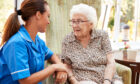 A photo of a carer with elderly lady.