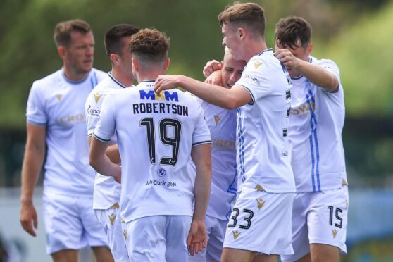 Dundee celebrate Luke McCowan's winner. Image: David Young.