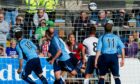 Gavin Swankie heads home to give Forfar a famous victory over Rangers in August 2013. Image: SNS.