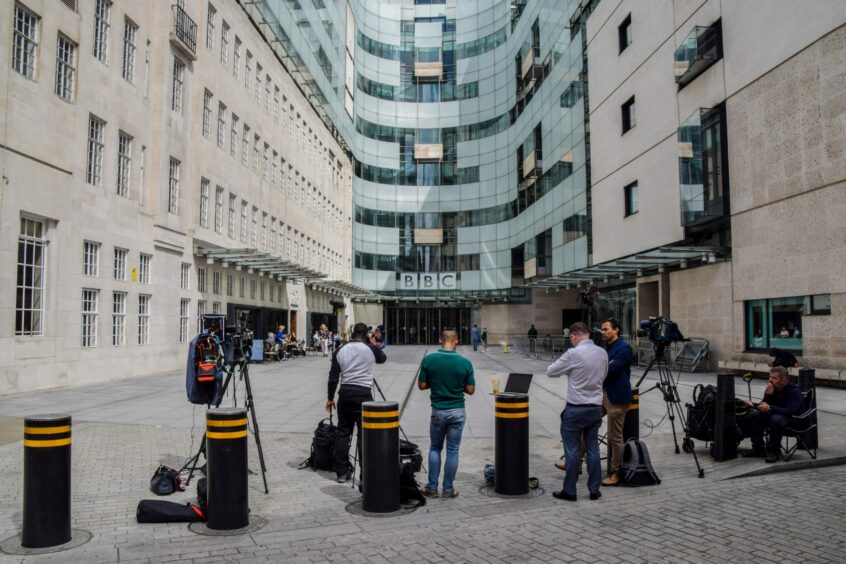 camera crews in the plaza outside BBC headquarters in London.