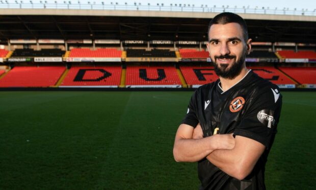 Aziz Behich poses during a Dundee United press call at Tannadice