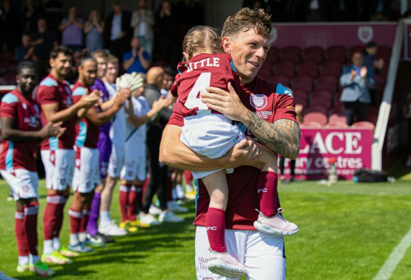 Ricky Little walks out for his Arbroath FC testimonial.