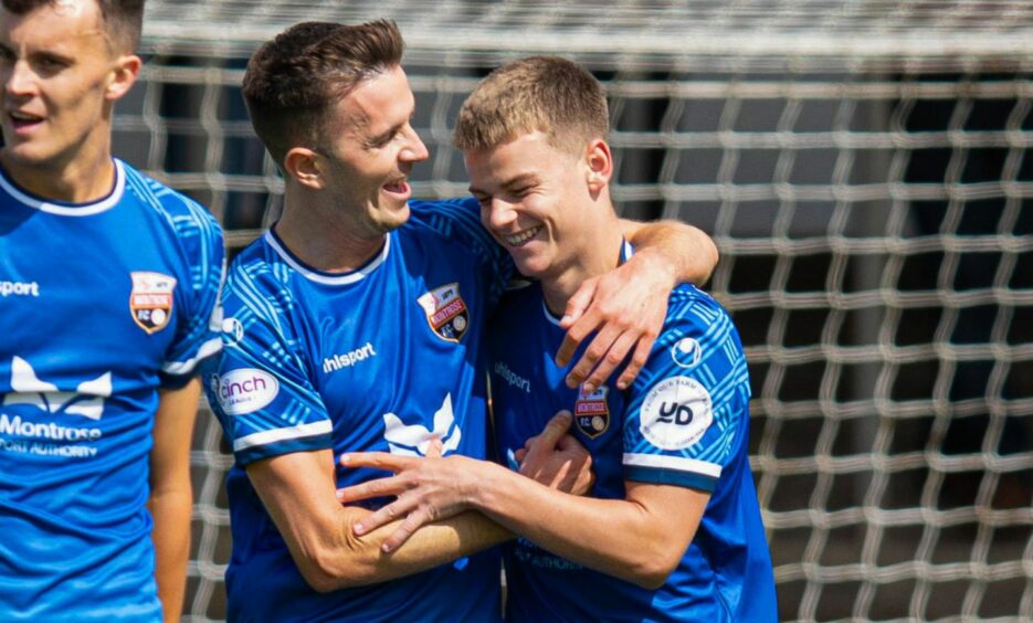 Graham Webster and Callum Grant of Montrose FC celebrate a win at Arbroath FC