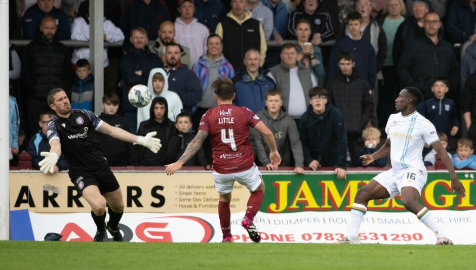 Zach Robinson makes it 1-0 at Arbroath. Image: SNS.